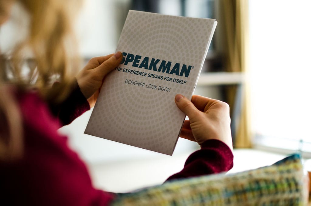 woman holding lookbook
