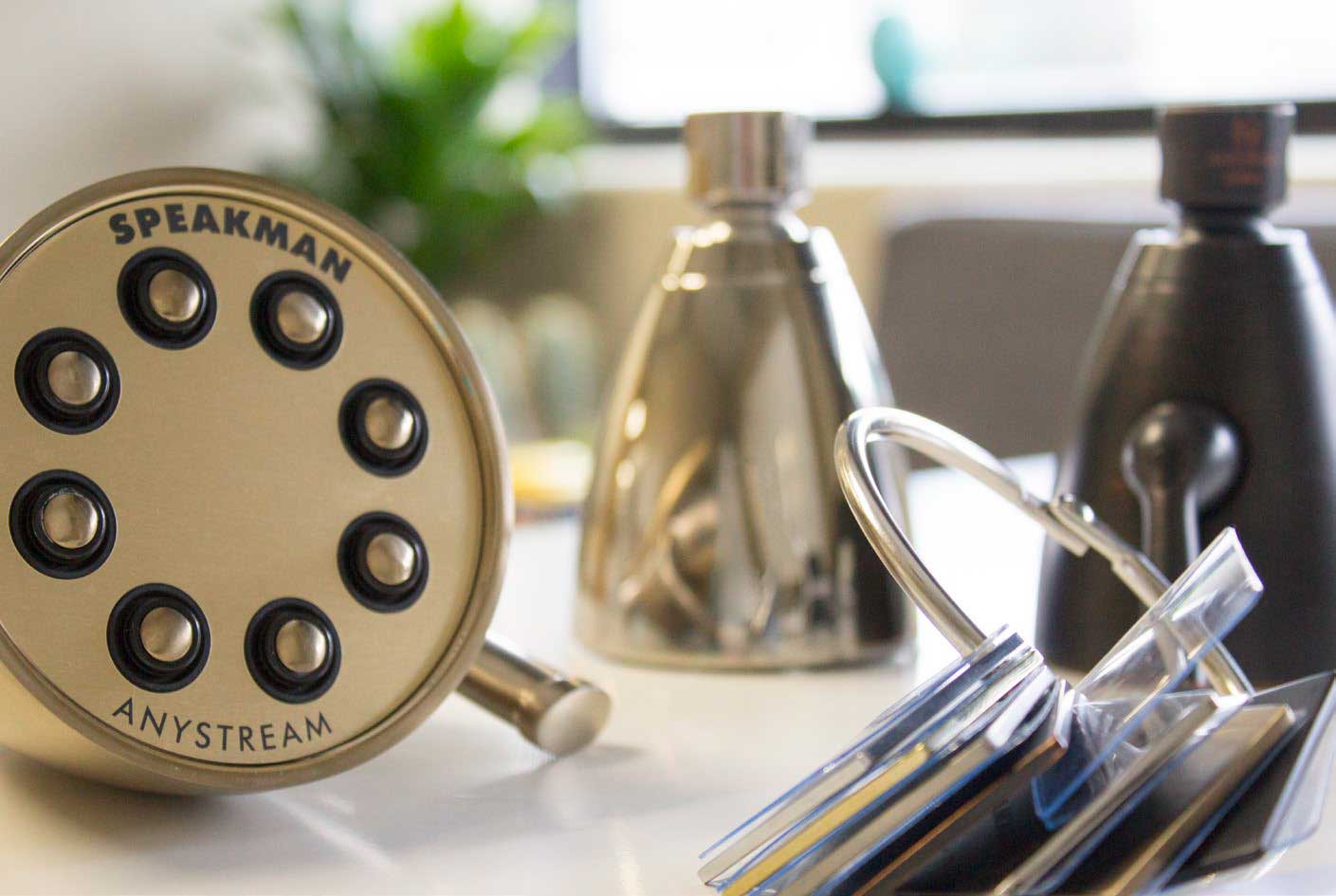 showerheads and swatches on desk